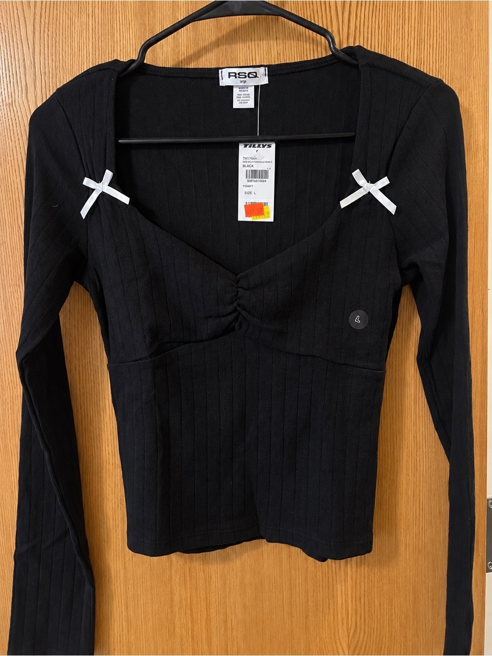 RSQ Black Ribbed Long-Sleeve V-Neck Top with White Bow Details
